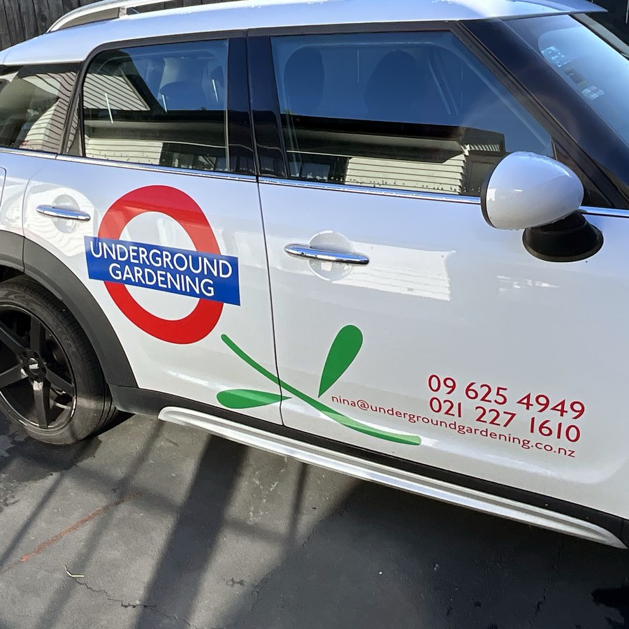 The Underground Gardening logo on a company vehicle